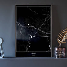 Lade das Bild in den Galerie-Viewer, Baden Dark Poster - Minimal - Vorschau neben Dekoartikeln vor dunkelgrauer Wand