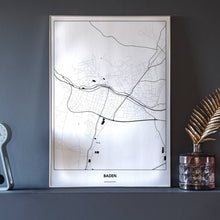 Lade das Bild in den Galerie-Viewer, Baden Light Poster - Minimal - Vorschau neben Dekoartikeln vor dunkelgrauer Wand