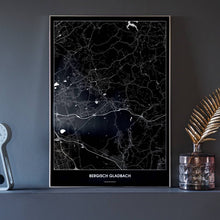 Lade das Bild in den Galerie-Viewer, Bergisch Gladbach Dark Poster - Minimal - Vorschau neben Dekoartikeln vor dunkelgrauer Wand