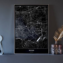 Lade das Bild in den Galerie-Viewer, Bochum Dark Poster - Minimal - Vorschau neben Dekoartikeln vor dunkelgrauer Wand