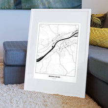 Lade das Bild in den Galerie-Viewer, Braunau am Inn Light Poster - Minimal - Vorschau am Boden auf Couch angelehnt in einem Wohnzimmer