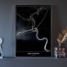 Lade das Bild in den Galerie-Viewer, Bruck an der Mur Dark Poster - Minimal - Vorschau neben Dekoartikeln vor dunkelgrauer Wand