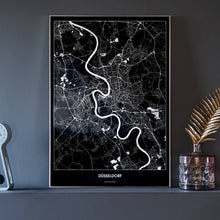 Lade das Bild in den Galerie-Viewer, Düsseldorf Dark Poster - Minimal - Vorschau neben Dekoartikeln vor dunkelgrauer Wand