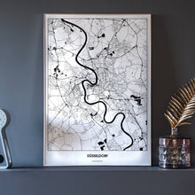 Lade das Bild in den Galerie-Viewer, Düsseldorf Light Poster - Minimal - Vorschau neben Dekoartikeln vor dunkelgrauer Wand