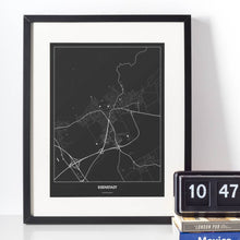 Lade das Bild in den Galerie-Viewer, Eisenstadt Dark Poster - Minimal - Vorschau vor weißer Wand zusammen mit Dekoartikeln