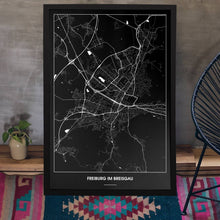 Lade das Bild in den Galerie-Viewer, Freiburg im Breisgau Dark Poster - Minimal - Vorschau aufgestellt auf Boden an grauer Wand angelehnt