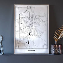 Lade das Bild in den Galerie-Viewer, Göttingen Light Poster - Minimal - Vorschau neben Dekoartikeln vor dunkelgrauer Wand