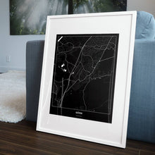 Lade das Bild in den Galerie-Viewer, Götzis Dark Poster - Minimal - Vorschau in einem Wohnzimmer am Boden aufgestellt und auf der Couch angelehnt