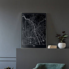 Lade das Bild in den Galerie-Viewer, Graz Dark Poster - Minimal - Vorschau in einem eleganten Zimmer mit Sessel und grauer Wand