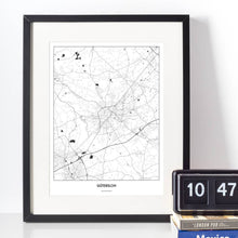 Lade das Bild in den Galerie-Viewer, Gütersloh Light Poster - Minimal - Vorschau vor weißer Wand zusammen mit Dekoartikeln