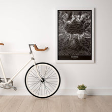 Lade das Bild in den Galerie-Viewer, Hochkönig Dark Poster - Minimal - Vorschau in einem hellen Zimmer mit Fahrrad an Wand angelehnt