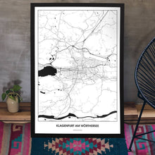 Lade das Bild in den Galerie-Viewer, Klagenfurt am Wörthersee Light Poster - Minimal - Vorschau aufgestellt auf Boden an grauer Wand angelehnt