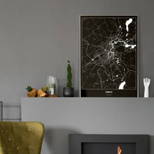 Lade das Bild in den Galerie-Viewer, Lübeck Dark Poster - Minimal - Vorschau in einem eleganten Zimmer mit Kamin und grauer Wandfarbe