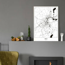 Lade das Bild in den Galerie-Viewer, Lübeck Light Poster - Minimal - Vorschau in einem eleganten Zimmer mit Kamin und grauer Wandfarbe