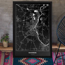 Lade das Bild in den Galerie-Viewer, Magdeburg Dark Poster - Minimal - Vorschau aufgestellt auf Boden an grauer Wand angelehnt