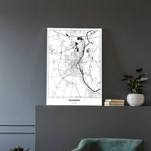 Lade das Bild in den Galerie-Viewer, Magdeburg Light Poster - Minimal - Vorschau in einem eleganten Zimmer mit Sessel und grauer Wand