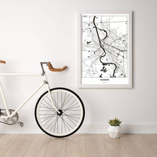 Lade das Bild in den Galerie-Viewer, Mannheim Light Poster - Minimal - Vorschau in einem hellen Zimmer mit Fahrrad an Wand angelehnt