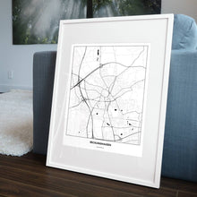 Lade das Bild in den Galerie-Viewer, Recklinghausen Light Poster - Minimal - Vorschau in einem Wohnzimmer am Boden aufgestellt und auf der Couch angelehnt