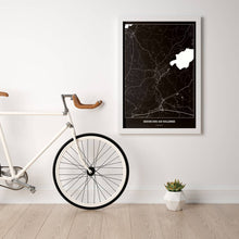 Lade das Bild in den Galerie-Viewer, Seekirchen am Wallersee Dark Poster - Minimal - Vorschau in einem hellen Zimmer mit Fahrrad an Wand angelehnt
