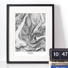 Lade das Bild in den Galerie-Viewer, Watzmann Light Poster - Minimal - Vorschau vor weißer Wand zusammen mit Dekoartikeln