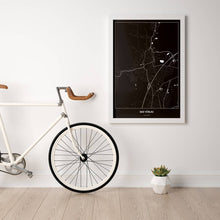 Lade das Bild in den Galerie-Viewer, Bad Vöslau Dark Poster - Minimal - Vorschau in einem hellen Zimmer mit Fahrrad an Wand angelehnt
