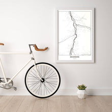 Lade das Bild in den Galerie-Viewer, Bischofshofen Light Poster - Minimal - Vorschau in einem hellen Zimmer mit Fahrrad an Wand angelehnt
