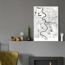Lade das Bild in den Galerie-Viewer, Duisburg Light Poster - Minimal - Vorschau in einem eleganten Zimmer mit Kamin und grauer Wandfarbe
