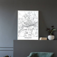 Lade das Bild in den Galerie-Viewer, Frankfurt am Main Light Poster - Minimal - Vorschau in einem eleganten Zimmer mit Sessel und grauer Wand
