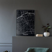 Lade das Bild in den Galerie-Viewer, Gelsenkirchen Dark Poster - Minimal - Vorschau in einem eleganten Zimmer mit Sessel und grauer Wand

