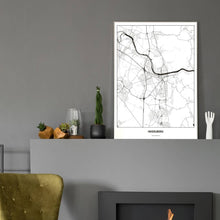 Lade das Bild in den Galerie-Viewer, Heidelberg Light Poster - Minimal - Vorschau in einem eleganten Zimmer mit Kamin und grauer Wandfarbe
