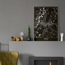Lade das Bild in den Galerie-Viewer, Karlsruhe Dark Poster - Minimal - Vorschau in einem eleganten Zimmer mit Kamin und grauer Wandfarbe
