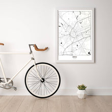 Lade das Bild in den Galerie-Viewer, Krefeld Light Poster - Minimal - Vorschau in einem hellen Zimmer mit Fahrrad an Wand angelehnt
