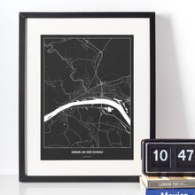 Lade das Bild in den Galerie-Viewer, Krems an der Donau Dark Poster - Minimal - Vorschau vor weißer Wand zusammen mit Dekoartikeln
