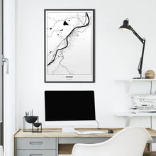 Lade das Bild in den Galerie-Viewer, Kufstein Light Poster - Minimal - Vorschau über Schreibtisch vor einer weißen Wand
