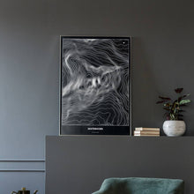 Lade das Bild in den Galerie-Viewer, Matterhorn Dark Poster - Minimal - Vorschau in einem eleganten Zimmer mit Sessel und grauer Wand
