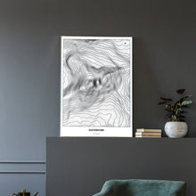 Lade das Bild in den Galerie-Viewer, Matterhorn Light Poster - Minimal - Vorschau in einem eleganten Zimmer mit Sessel und grauer Wand
