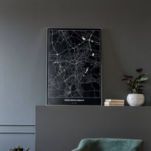 Lade das Bild in den Galerie-Viewer, Mönchen­gladbach Dark Poster - Minimal - Vorschau in einem eleganten Zimmer mit Sessel und grauer Wand

