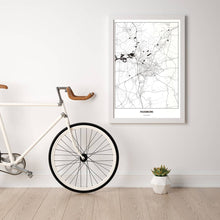 Lade das Bild in den Galerie-Viewer, Paderborn Light Poster - Minimal - Vorschau in einem hellen Zimmer mit Fahrrad an Wand angelehnt
