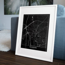 Lade das Bild in den Galerie-Viewer, Recklinghausen Dark Poster - Minimal - Vorschau in einem Wohnzimmer am Boden aufgestellt und auf der Couch angelehnt
