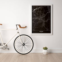 Lade das Bild in den Galerie-Viewer, Reutlingen Dark Poster - Minimal - Vorschau in einem hellen Zimmer mit Fahrrad an Wand angelehnt
