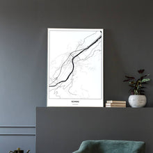 Lade das Bild in den Galerie-Viewer, Schwaz Light Poster - Minimal - Vorschau in einem eleganten Zimmer mit Sessel und grauer Wand
