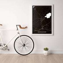 Lade das Bild in den Galerie-Viewer, Seekirchen am Wallersee Dark Poster - Minimal - Vorschau in einem hellen Zimmer mit Fahrrad an Wand angelehnt
