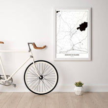 Lade das Bild in den Galerie-Viewer, Seekirchen am Wallersee Light Poster - Minimal - Vorschau in einem hellen Zimmer mit Fahrrad an Wand angelehnt
