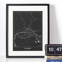 Lade das Bild in den Galerie-Viewer, Vöcklabruck Dark Poster - Minimal - Vorschau vor weißer Wand zusammen mit Dekoartikeln
