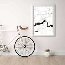 Lade das Bild in den Galerie-Viewer, Völkermarkt Light Poster - Minimal - Vorschau in einem hellen Zimmer mit Fahrrad an Wand angelehnt
